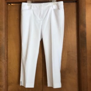 White dress crop pants with a 1 inch slit